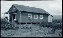 Father Ulrich Taube, SS.CC., with members of the Society of Mary and others on the porch of the rectory of Star of the Sea Church, Kalapana, Hawaii Island.